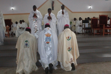 The new Priests praying for the A/Bishops