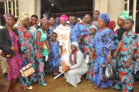 Msgr Anthony Olawumi with some guests and well wishers.