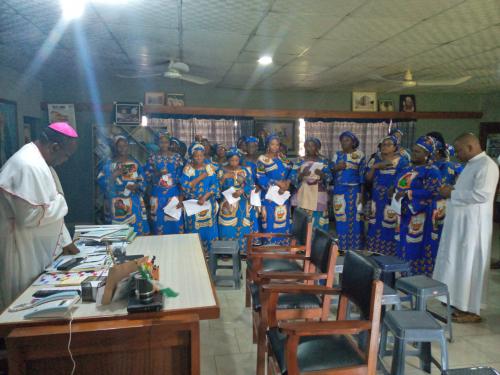 Bishop Badejo praying for the entourage.