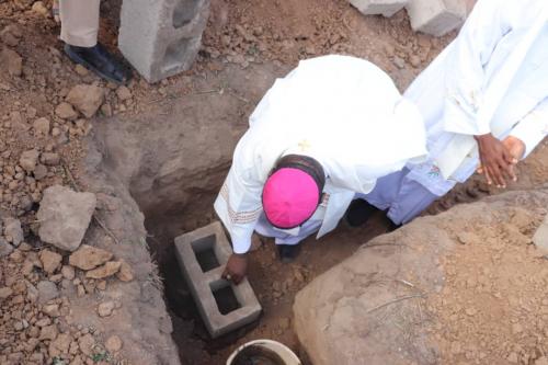 Bishop Emmanuel Badejo laying the first block of St. Patrick Catholic Church Clinic, igbeti.