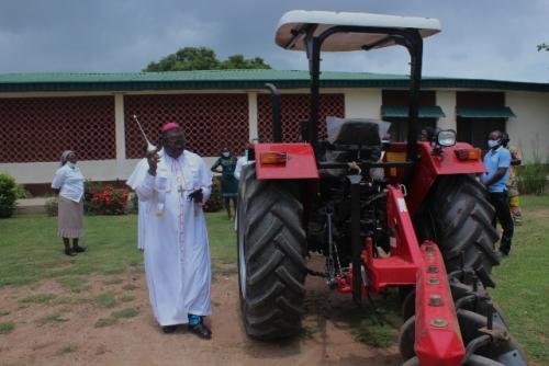 Bishop Badejo blessing the new tractor bought by the Justice Development and Peace Movement of the Catholic diocese of Oyo on the 8th of July, 2020 at the Bishop’s office.