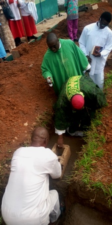 Bishop Emmanuel Badejo assisted by Mr Anthony Adetoro, the Pastoral Council Chairman as he lays the first block of the foundation.